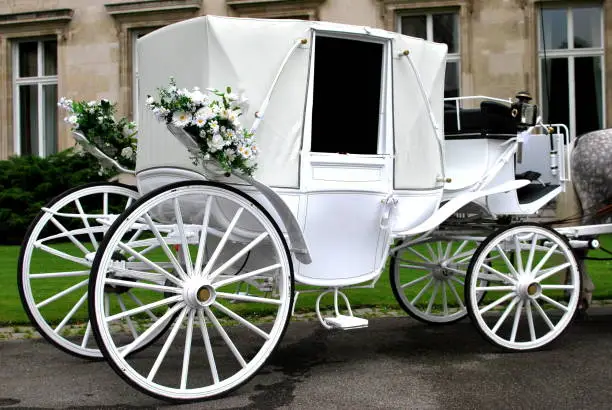 traditional historical wedding carriage in white