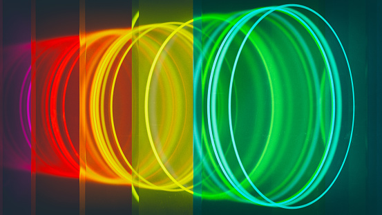 Background image of glowing rings between glass tiles