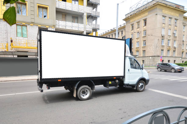 istock Commercial truck with empty mockup banner on a van 1252420399