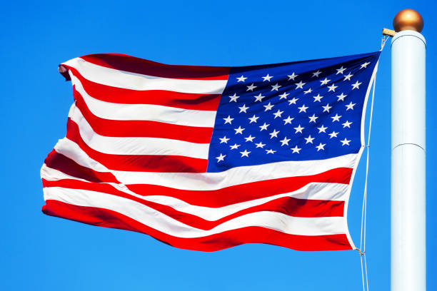 istock American flag on the blue sky 1252421443