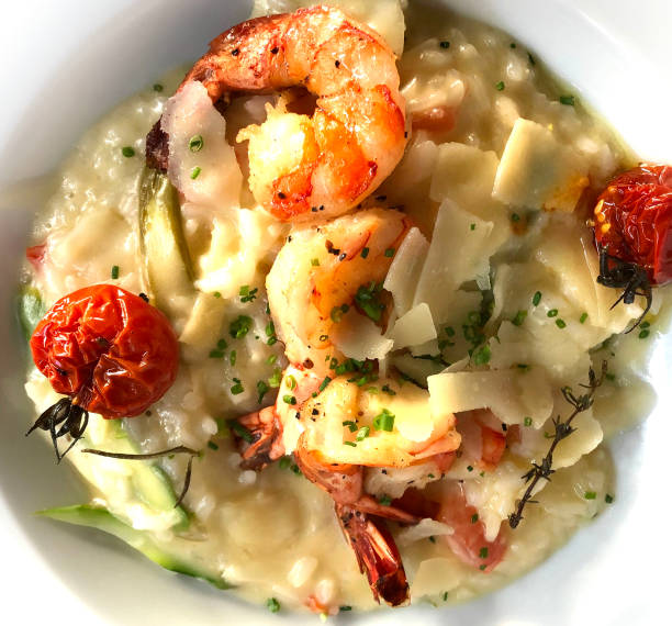 istock Asparagus risotto with grilled shrimps and grana. 1252422155