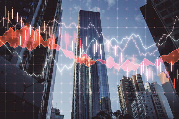 istock Glowing stock chart on blurry city background. 1252423464