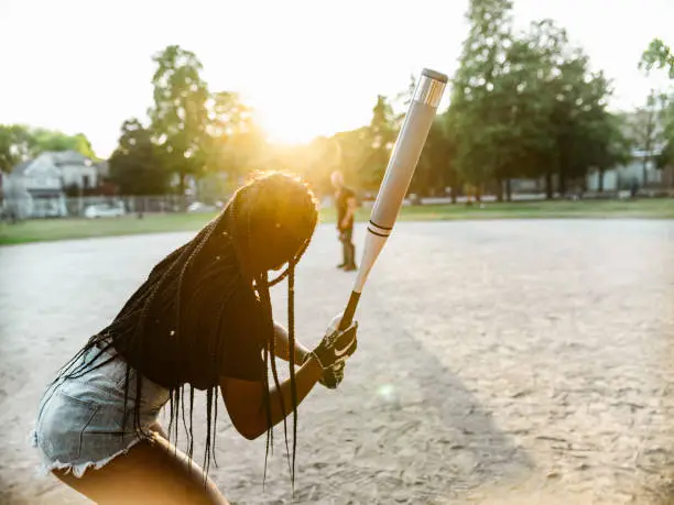 Photo of Young Black woman at the softball