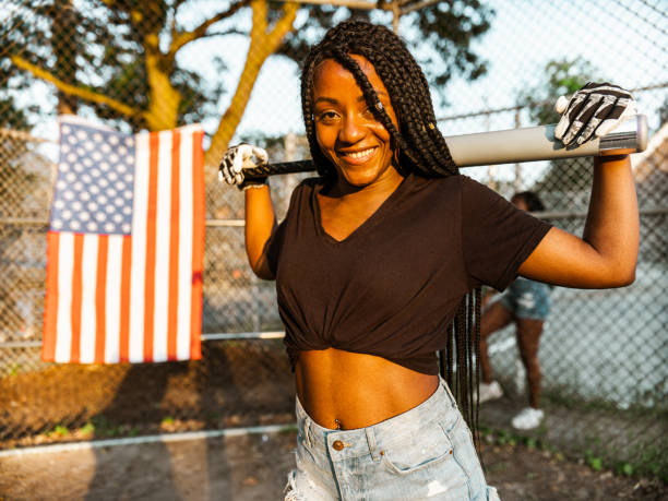 istock Young Black woman at the softball 1252444196