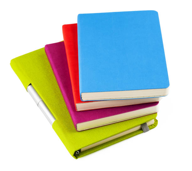 istock Colourful notebooks with ballpoint pen 1252446388