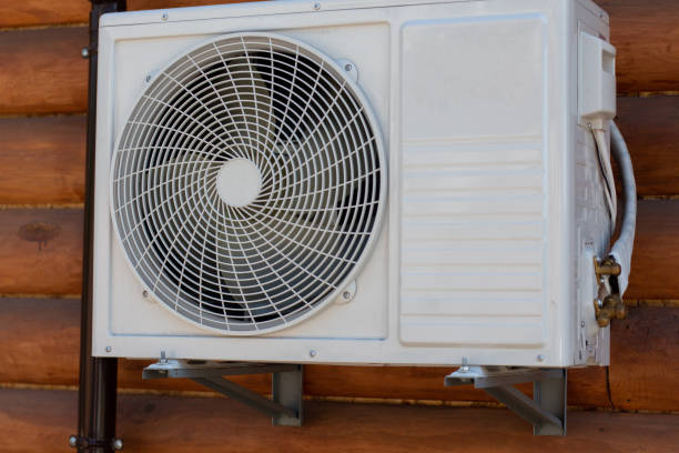 istock white air conditioner hanging on the wall 1252446710