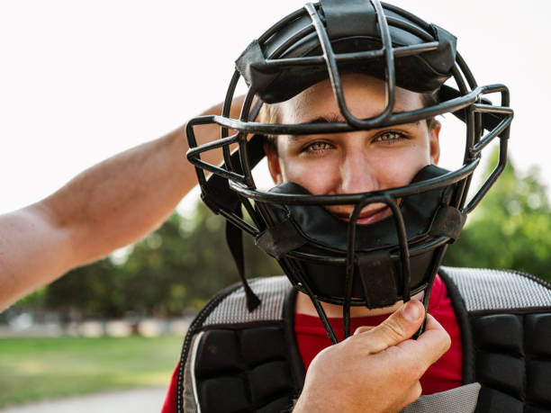 istock Young catcher and the coach 1252458631