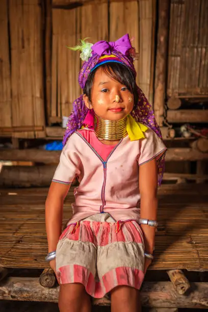 Portrait of a long-neck little girl Padaung (Karen) tribe, Mae Hong Son Province in Northern Thailand.