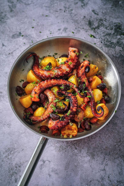 istock Octopus Tentacles with Potatoes and Fresh Lemon 1252463589