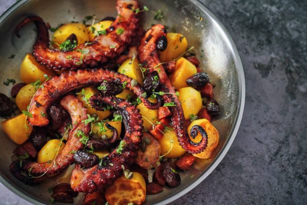 istock Octopus Tentacles with Potatoes and Fresh Lemon 1252463615