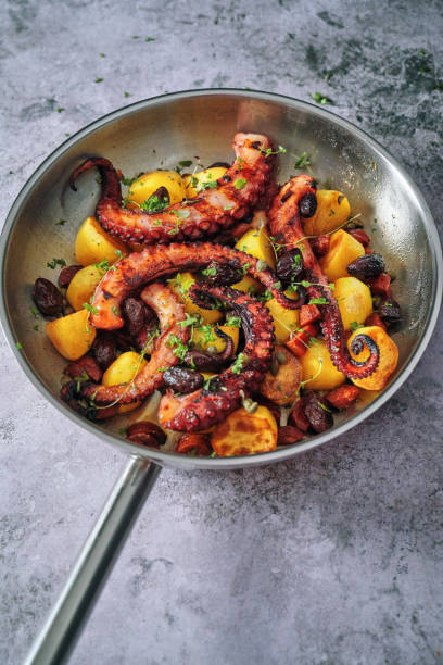 istock Octopus Tentacles with Potatoes and Fresh Lemon 1252463697