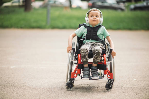 istock Disabled  boy listening a music 1252471170