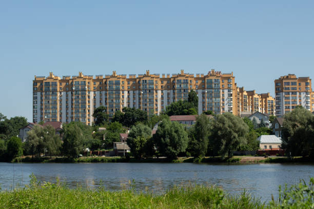 istock apartment building on a background of blue sky 1252471396