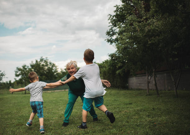 istock Boys running to grandmother 1252473744