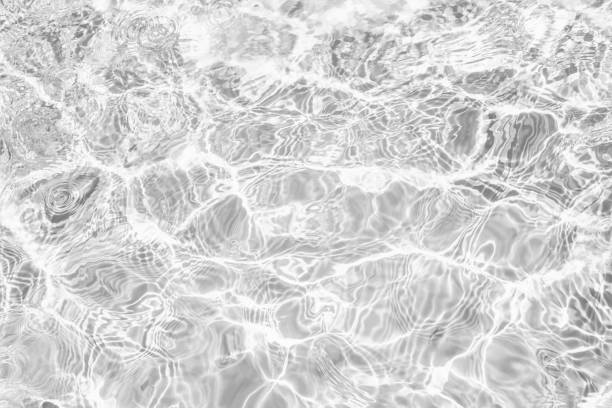 istock desaturated transparent clear calm water surface texture 1252475588