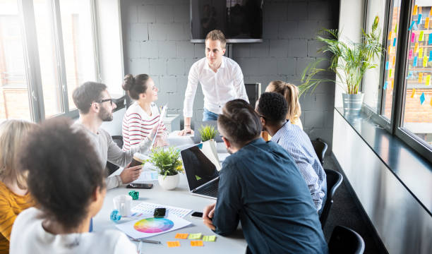 istock Young creative business people meeting at office. 1252481219