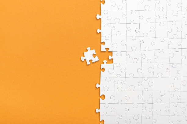 istock Business concept of white jigsaw puzzle. 1252483375
