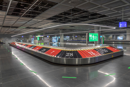 Frankfurt, Germany - June 20, 2020: empty baggage belt at the Frankfurt Airport due to low traffic because Corona close down. Since Mid June more  destinations are cheduled ex and to Frankfurt.