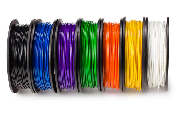 istock Black, red, blue, green, violet, orange, yellow, white filament 3d printer isolated on white background 1252484726
