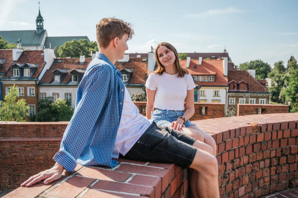 istock Young couple talking and having fun outdoors 1252491229
