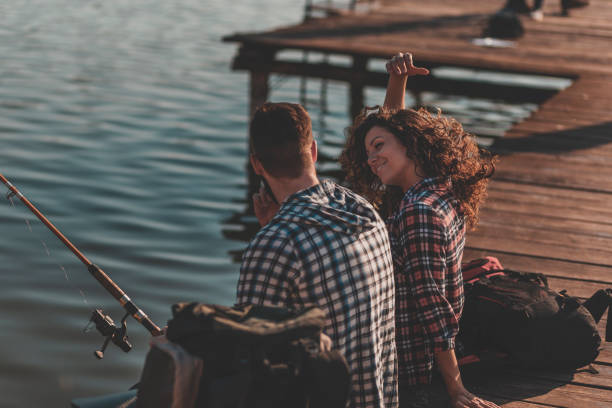 istock Couple enjoying sunny day in nature 1252493940