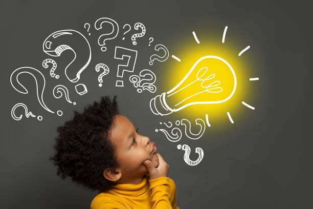 istock Thinking child and light bulb, brainstorming and idea concept 1252494242
