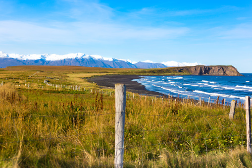 Husavik, Iceland: Coastline and Snowcapped Mountains