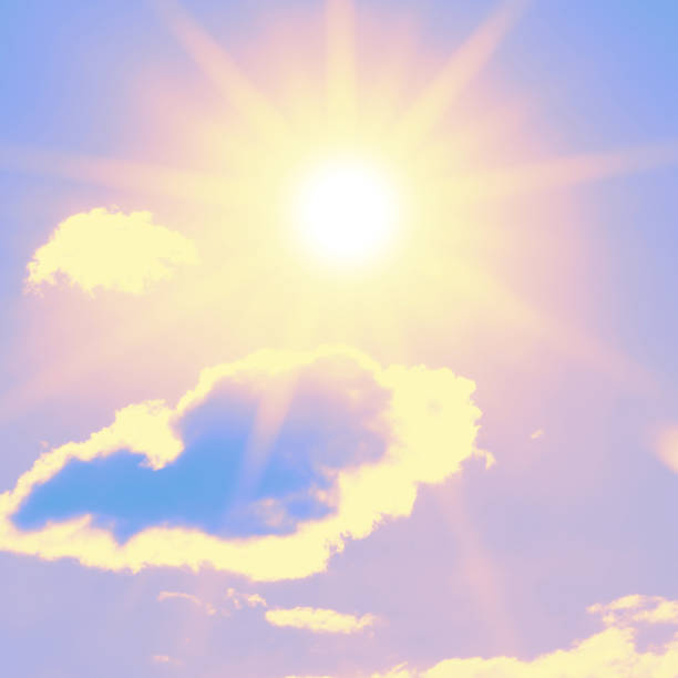 istock Bright sun with beautiful beams in the sky with clouds 1252507264