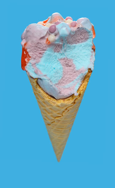 istock side view marshmallow and raspberry flavor ice cream cone with couple of bites on blue background 1252523943