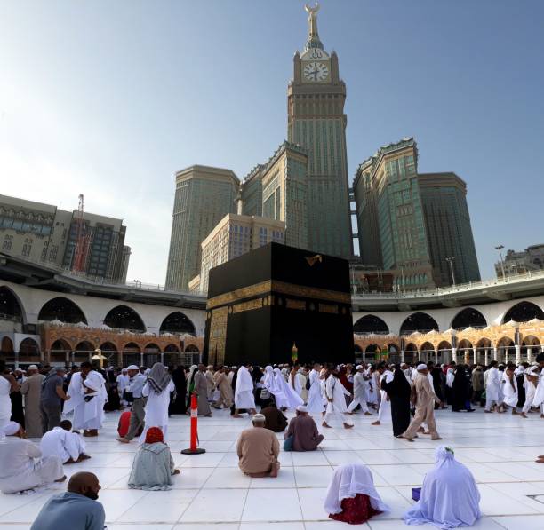 Muslim performing tawaf at the holy Kaabah MAKKAH, SAUDI ARABIA - FEBRUARY 10, 2017: Muslim performing tawaf at holy Kaabah in the morning. Muslims face the direction of Kaaba when performing prayer kaabah stock pictures, royalty-free photos & images