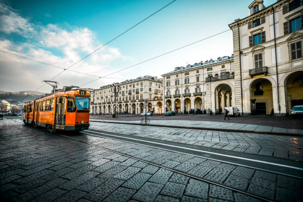 antiguo tranvía en main street en turín, italia - trolley bus fotografías e imágenes de stock