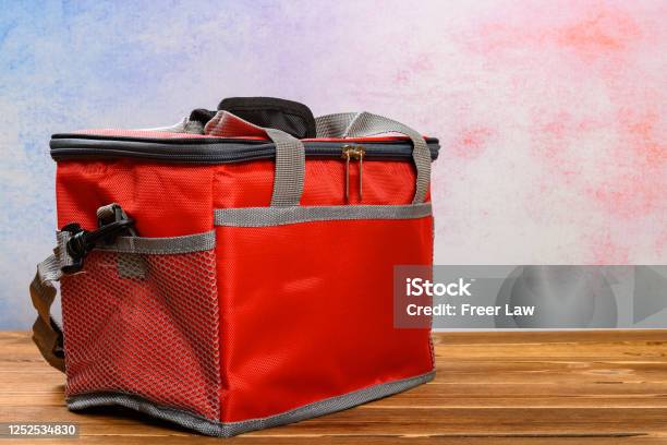 Red Lunch Pack Carrier Or Insulation Bag On A Wood Table Stock Photo - Download Image Now