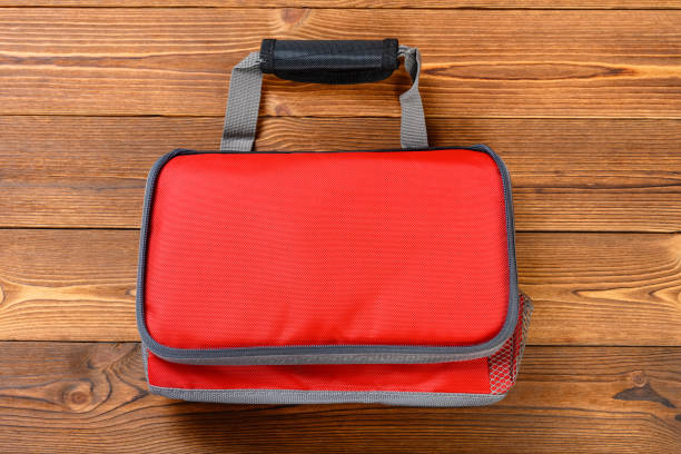 istock folded red lunch pack carrier or insulation bag on a wood table 1252536359