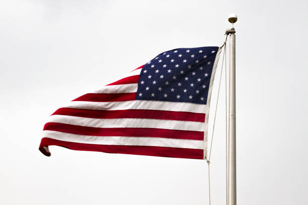istock American Flag against White Background 1252548309