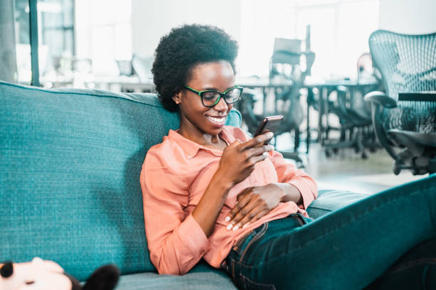 istock Businesswoman having a break in the office. 1252568103