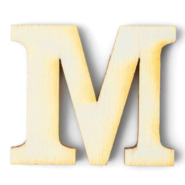 istock Wooden Alphabet letter with drop shadow M 1252581797