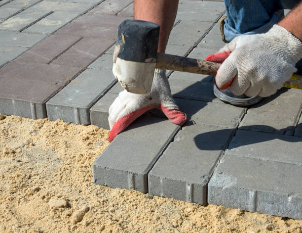 istock Installation of paving slabs on a sandy base 1252588023