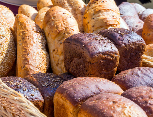 istock Fresh cereal bread and loaves with seeds 1252588632