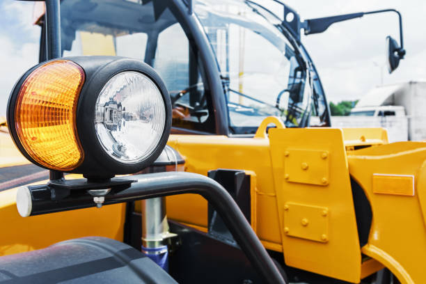 istock parking lamp on a yellow tractor 1252589935
