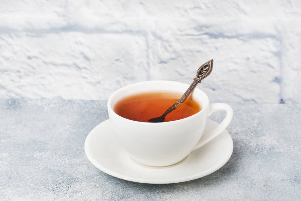 istock Herbal tea in a white Cup. Gray background with copy space. 1252595072