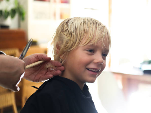istock A young boy getting a haircut 1252601114