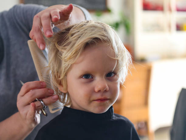 istock A young boy getting a haircut 1252601119