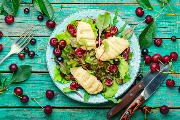 istock Summer green salad with berry. 1252601377