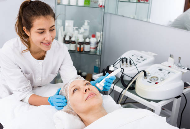 istock Mature woman having beauty procedures 1252602683