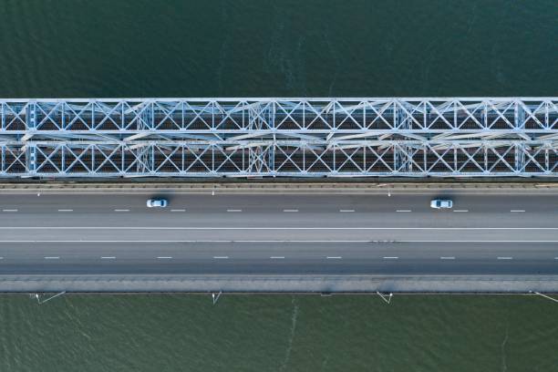 istock Highway and railway bridges over river. 1252605710