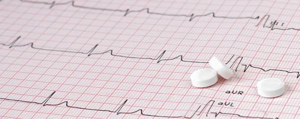 istock Close up Electrocardiogram with pills. Medical concept. Selective focus 1252610995