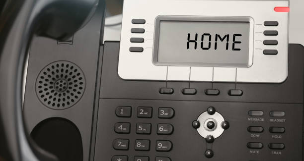 istock Close up IP Phone with text HOME. Office concept 1252611022