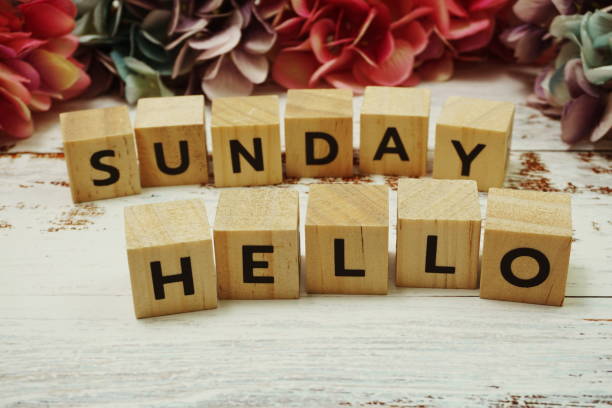 istock Hello Sunday alphabet letter on wooden background 1252614777