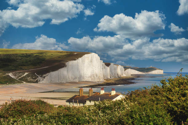 Seven Sisters country park tall white chalk cliffs, East Sussex, UK Seven sisters country park tall white chalk cliffs, East Sussex, UK. brighton england stock pictures, royalty-free photos & images