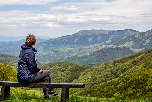 Woman enjoying mountain view on Balkan mountains in Serbia